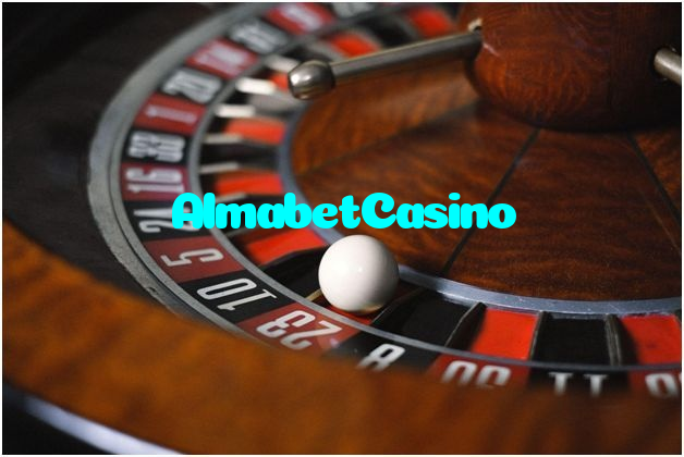 AlmabetCasino casino presented on mobile device in Pakistan with slots and live games